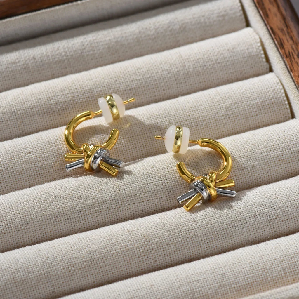 2025 New Fashion Europe America Gold Silver Knotted Earrings Woman Designer Charm Jewelry Trend